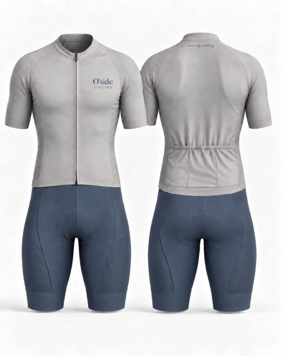 Oceanside Cycling kit concept: light-gray jersey with slate-blue O'side chest logo and blue bib shorts, front and back